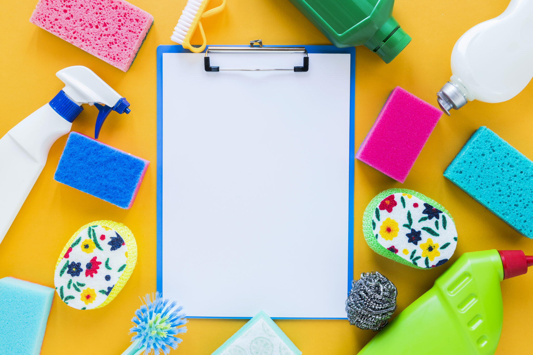 top-view-arrangement-with-clipboard-cleaning-products